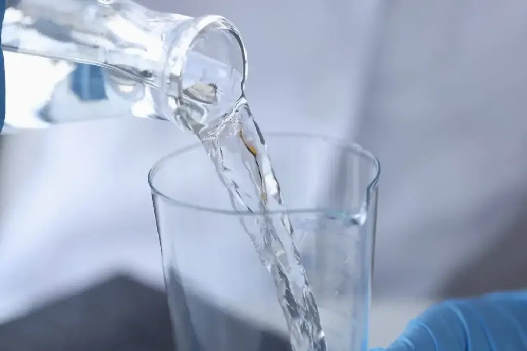 Water poured from a flask into a glass during a WETS pilot study